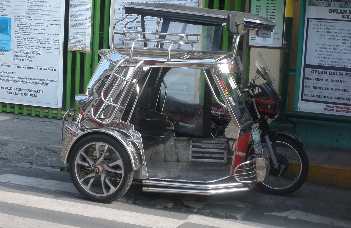NomadUpdates's tweet photo. Tricycle taxi in Manila. Looks very inviting. #manila #Philippines https://t.co/pGPz5bYow3