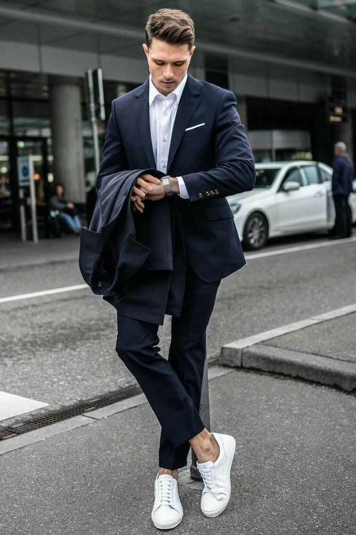 Number 1. If you're a formal/Office person, you can pair your monochrome sneakers with a dashing suit and still look like a boss. Dear Nigerian workers, it's not all the time you have to wear Oxford brogues, sometimes add a little flavor to your footwear fashion.