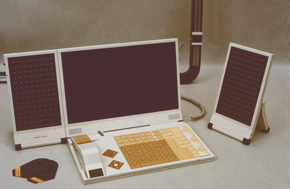 Tangent: The rabbit hole led me to this Soviet laptop computer design. Does anyone know what those detachable panels are? And are those grey and yellow things, bottom left, some kind of memory cards?