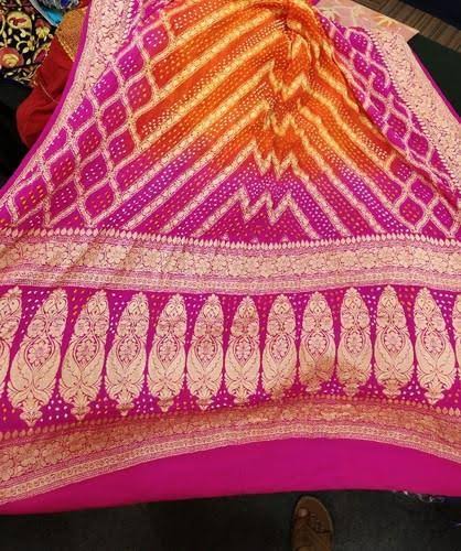 8)Bandhani SareeBandhani is a tie dye textile process and the technique,variety and colour used in Bandhana are highly decorated. Bandhani Sarees are being sold all over India, especially during the festive and wedding seasons.