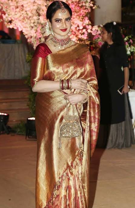 11)Kanjeevaram SareeKanjeevaram Saree -weaved frm pure mulberry silk thread, made by the weavers of kancheepuram. Kanchipuram Sarees has been recognized as a Geographical indication by the Government of India.Who else can be a better model to Kanjeevaram none other then  #REKHA