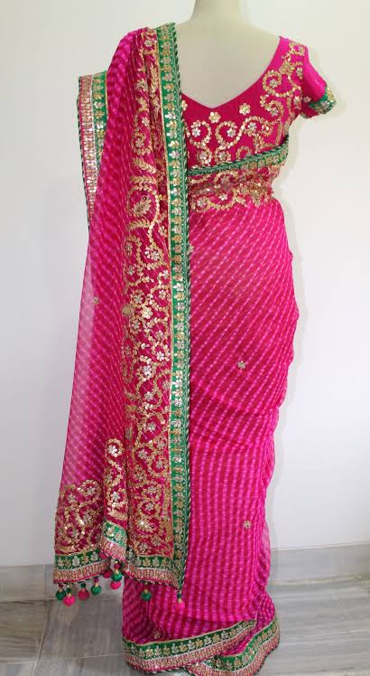 22)Gota SareeGota Patti Sarees originated in Rajasthan,This type of Indian embroidery used extensively in wedding and formal clothes. The metal embroidery of Rajasthan is known as Gota work