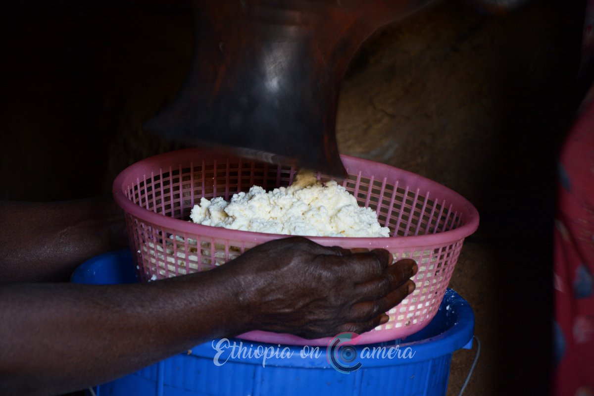 Ethioncamera's tweet photo. #Ayib, a traditional #Ethiopian cottage cheese,  is made from sour milk after the butter is removed by churning. The defatted milk is heated to about 50°C until a distinct curd forms. It is then allowed to cool gradually, and the curd is ladled out or filtered. 
#VisitEthiopia https://t.co/FqqRO5rR5P