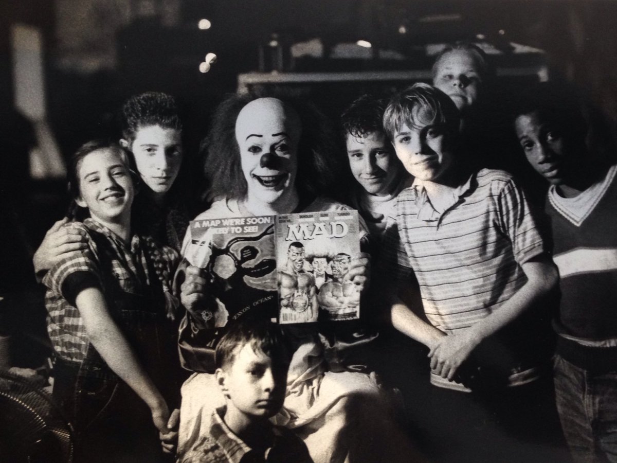 HorrorCarnival's tweet photo. It (1990), Behind the Scenes with The Losers Club and Pennywise:  Emily Perkins, Seth Green, Tim Curry, Ben Heller, Jonathan Brandis, Brendon Crane, Marlon Taylor, and Adam Faraizl. https://t.co/yNBLr6uywR