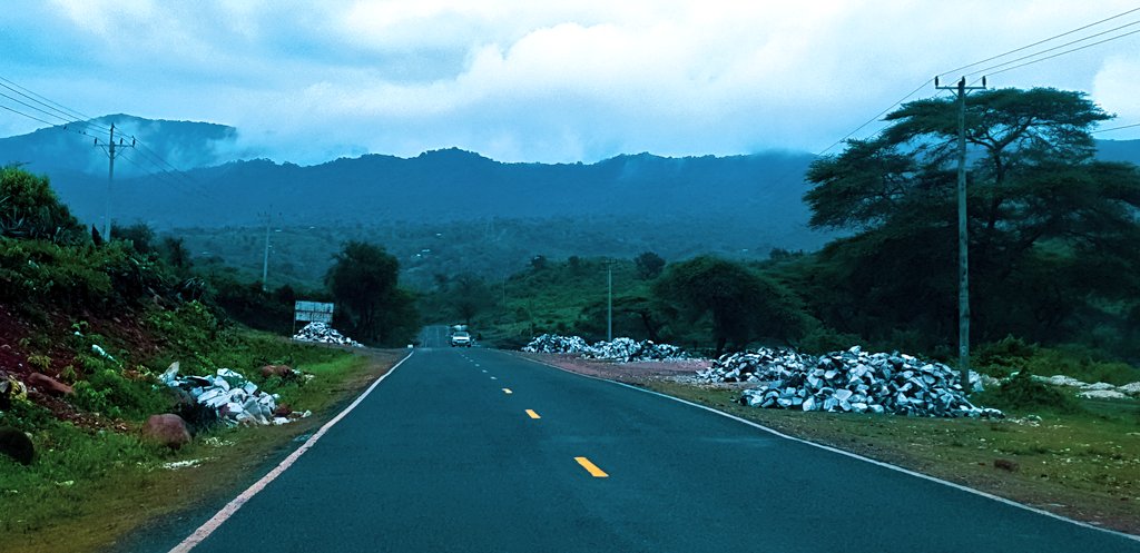 The road is beautifully tarmacked all the way to Lokichar (These pics are from between Ortum and Kainuk). The silt-heavy Maruny River (2 &3) contains gold deposits that the local community sieve from the river. Also on its banks is Marich Pass.