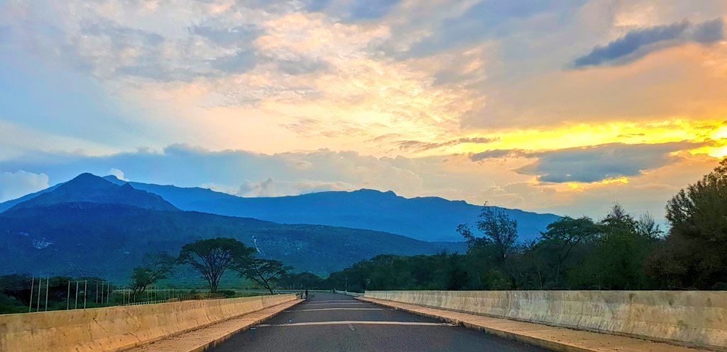 The road is beautifully tarmacked all the way to Lokichar (These pics are from between Ortum and Kainuk). The silt-heavy Maruny River (2 &3) contains gold deposits that the local community sieve from the river. Also on its banks is Marich Pass.