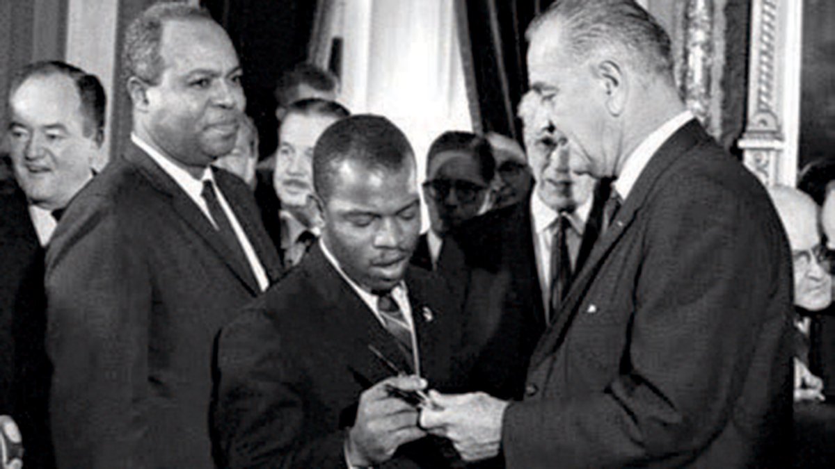 John Lewis, then 25 years old, attended the 1965 signing of the VRA and is pictured here with President Lyndon Johnson. This moment was the culmination of his work as the Chairman of the Student Nonviolent Coordinating Committee. 2/12