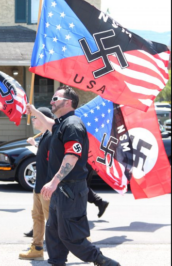 8/ The NSC's link to the NSM is Anthony Petruccelli, a white nationalist of almost three decades, who also served as Super Happy Fun America's official t-shirt salesnazi at the Straight Pride Parade.That's Petruccelli in the white sunglasses.