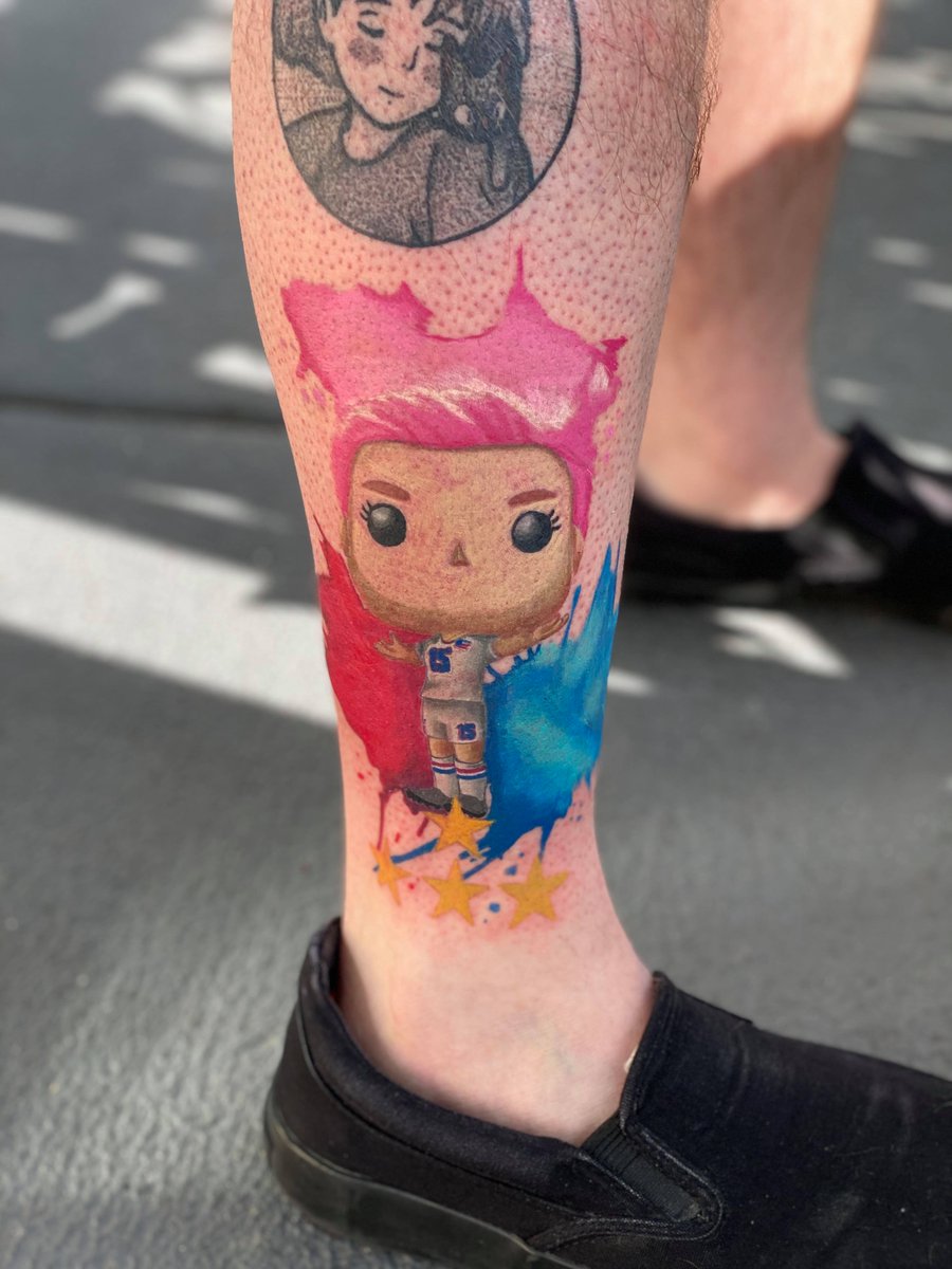 soccerpat's tweet photo. Last year while hanging out with @AmericanOutlaws for the #TourDeFour in France, I told everyone I would get a tattoo if the @USWNT won. After deciding on a design and a slight pandemic delay, I present my @mPinoe tattoo! https://t.co/Xa4Sl6kLXF