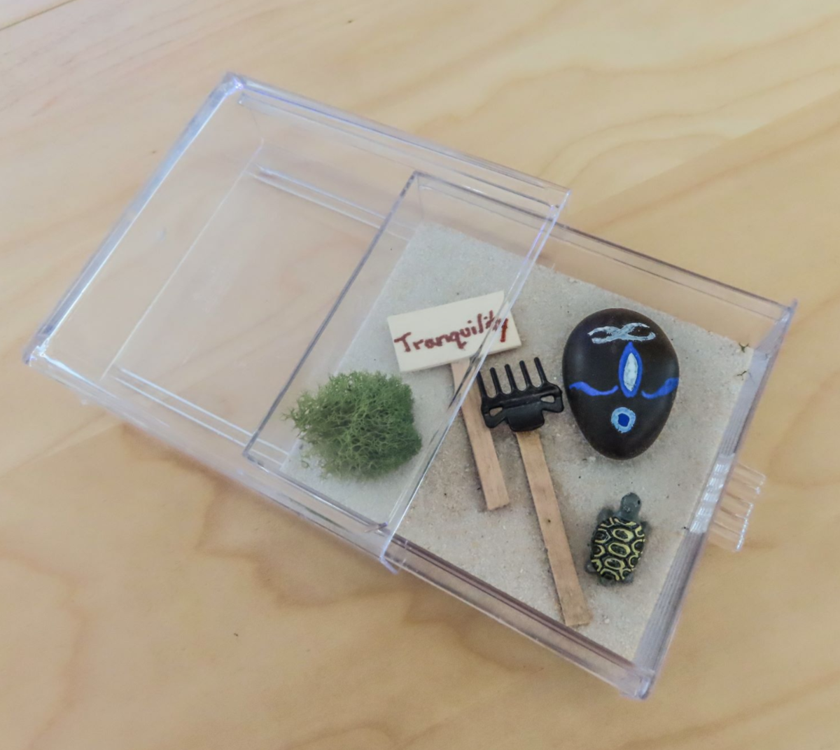 EBTMorlando's tweet photo. Zen gardens evoke feelings of tranquility, calmness, &amp; peace. Students create their very own portable garden using sand, moss, &amp; choice of zen figurine with this DIY kit! Hand paint your rock &amp; create the raking tool used to “doodle” in the sand.  An educational sheet is included https://t.co/xkuD8Jv9kh