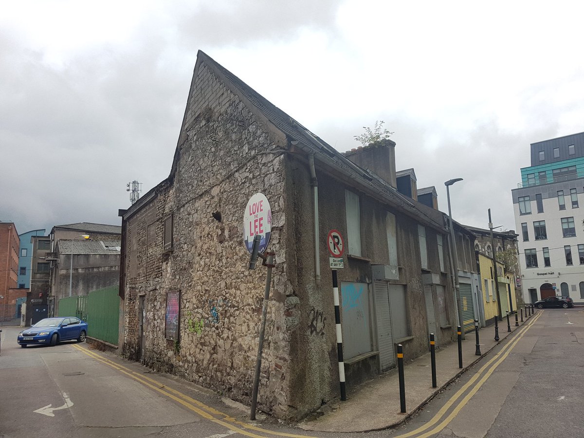 another boarded up old building in  #Corkcity centre, beautiful stonework on the gable end, someone's home, work, play, very sad but least its being used to communicate two powerful urgent messages  @savecorkcity  #heritage  #equality  #homeless  #nature  #socialcrime  #Ireland  #CorkCC