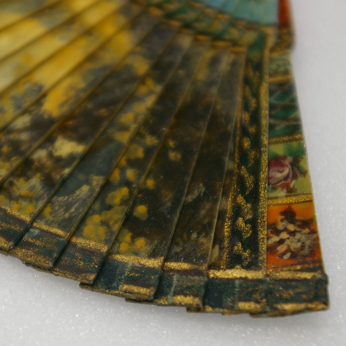 Tex_Con_Ltd's tweet photo. It’s #MacroMonday and we wanted to show this miniature painted and varnished ivory or bone brisé fan, measuring 68mm long. How sweet is that? #textileconservation https://t.co/bYraFL2VaP