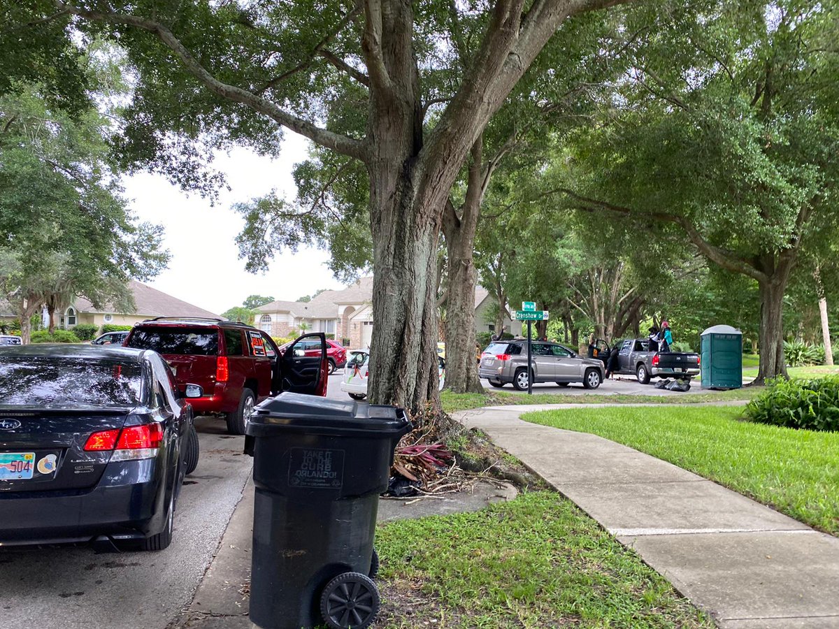 FloridaFaculty's tweet photo. Breaking: #ValenciaCollege POC #adjunct faculty, students, alums are leading a massive socially distanced caravan on Valencia College President Sandy Shugart's house to demand he let faculty vote for their union. #StrikeForBlackLives https://t.co/69LAwbkch8