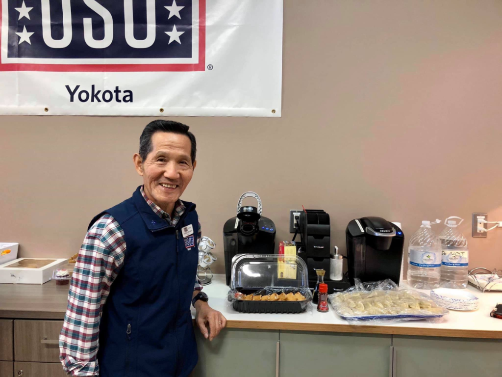The_USO's tweet photo. After a pivotal moment where his father introduced him to the U.S. military community as a child, Hideo Furuhashi would go on to become one of the longest-serving USO volunteers in the world: https://t.co/u0q1iqgYhN https://t.co/CBDA0ccNOY