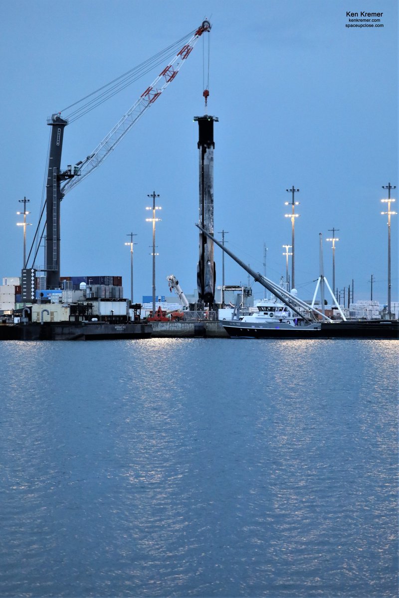 ken_kremer's tweet photo. Fully leg retracted #Falcon9 2x recycled 1st stage at blue hued dusk with water reflections-torrentially drenched by Space Coast rains this evening Jul 27 @PortCanaveral. #SpaceX from #AnasisII and #Demo2 launches https://t.co/zSYdd0opVe
