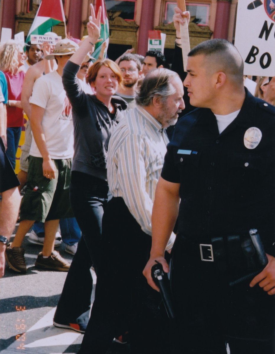 WE HAD OUR OWN SNIPERS.All it took was 30 American flags and five Israelis flags.The ENTIRE ANTIWAR PROTEST came to a screeching halt.The LAPD had to punch people in the face. Look at the cop's hand on his pistol. It was BAD.