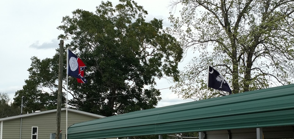 Burke County is represented here by 2 state flags, neither of which are the current state flag for it's own state.