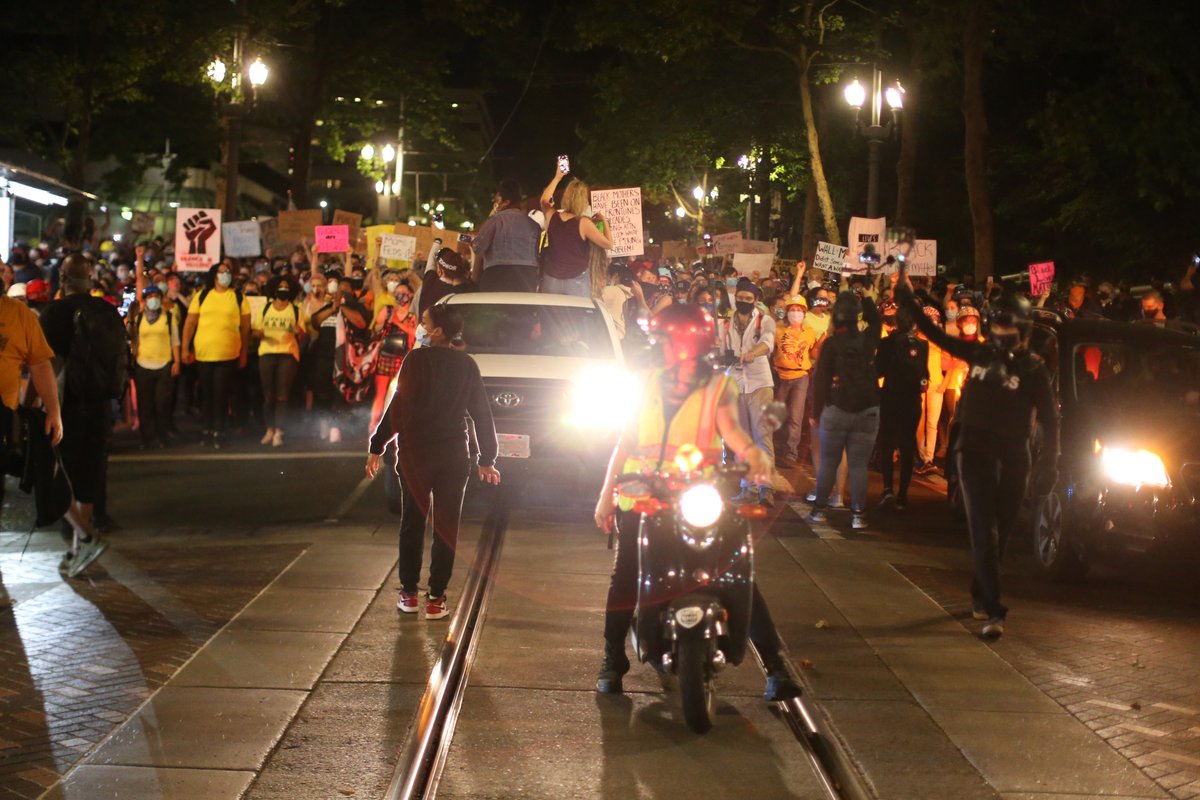 Many moms were part of tonight's protest in downtown Portland. The crowd marched to Pioneer Courthouse Square, then headed back to the Justice Center. (photos by  @bethnakamura)