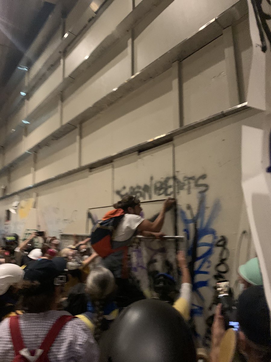 This door is coming down! #defendpdx #wallofmoms #PortlandProtests #PortlandMoms #PDXprotest #goodtrouble
