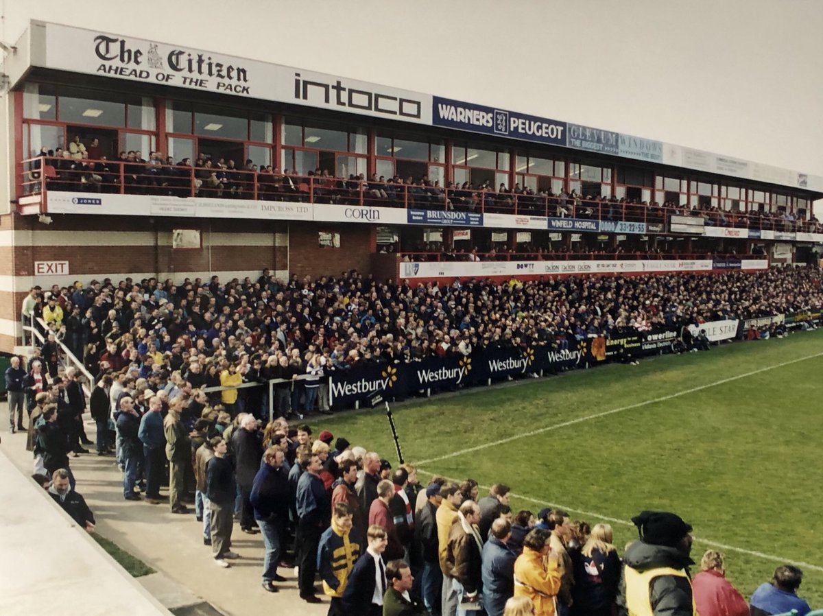 spandau_wirral's tweet photo. How the home of @gloucesterrugby once was, the old main stand at Kingsholm in all its glory, followed by the view of Kingsholm from the top of the Cathedral. Then some more familiar sites, the Tump and the Shed in the mid 90’s (pics by Tony Hickey) https://t.co/1MufJxuHVo