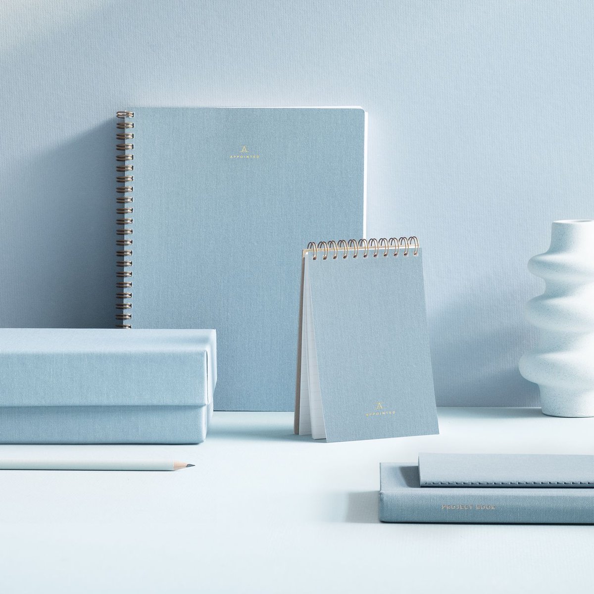 appointedco's tweet photo. Blue skies ahead ☀️☁️ Shop notebooks, notepads, planners, and more in our favorite color this season—chambray blue at https://t.co/8WA3IHVzEe. #getappointed https://t.co/vCVWk9tBP6