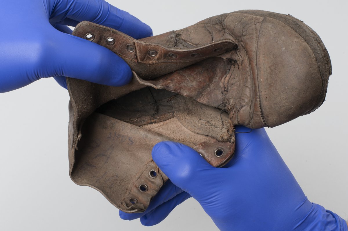 AuschwitzMuseum's tweet photo. A touching #discovery was made during conservation of shoes of child victims of the German Nazi #Auschwitz camp: a handwritten inscription with the name of Amos Steinberg deported from #Theresienstadt Ghetto with his mother &amp; documents in Hungarian: https://t.co/lByKFNXfVc https://t.co/EK3zoYtTYj