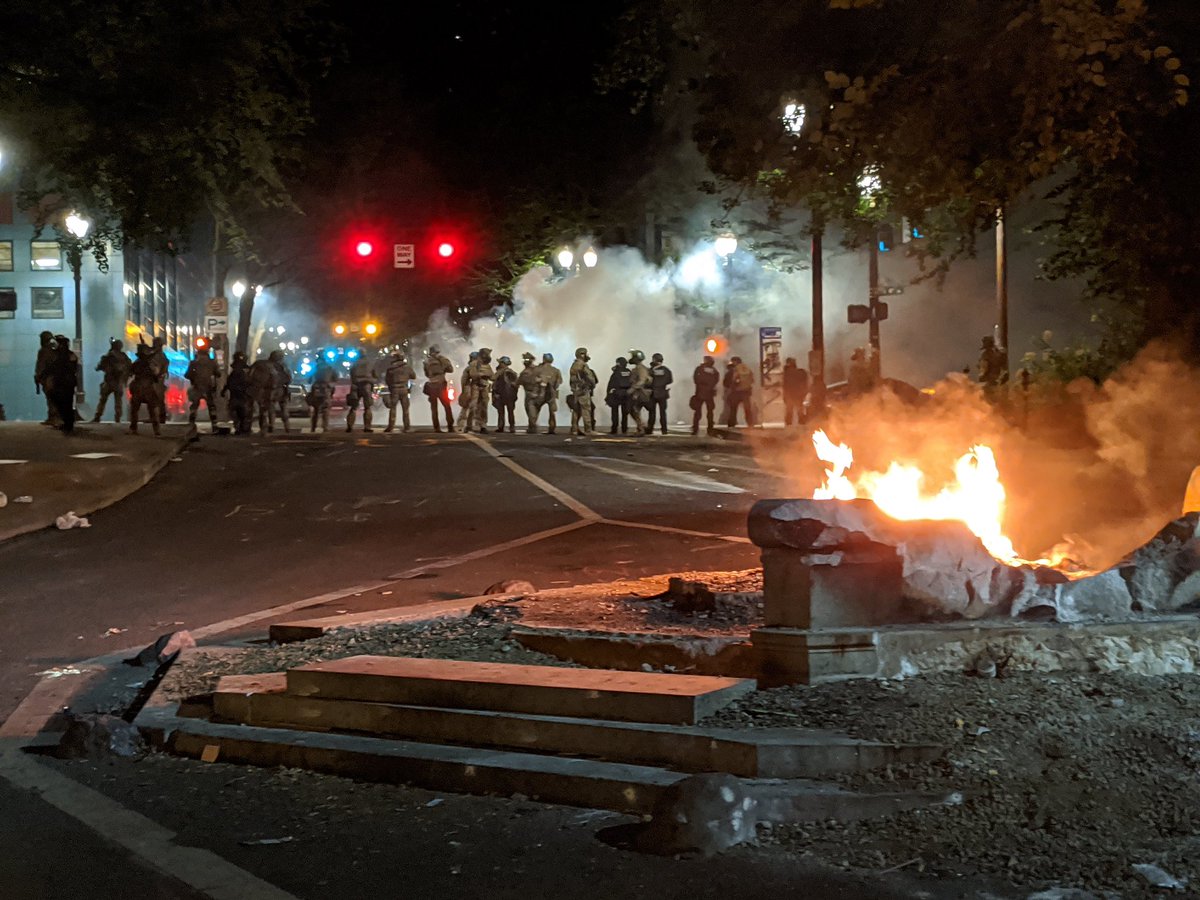 Federal officers are now moving through the streets of Portland, using tear gas and less-lethals to push the crowds away.