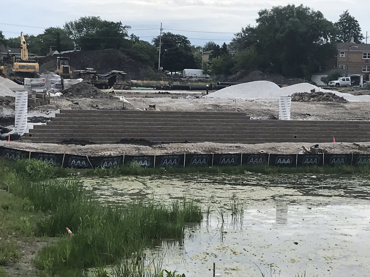 The retaining wall installation for the Gemini field is underway!