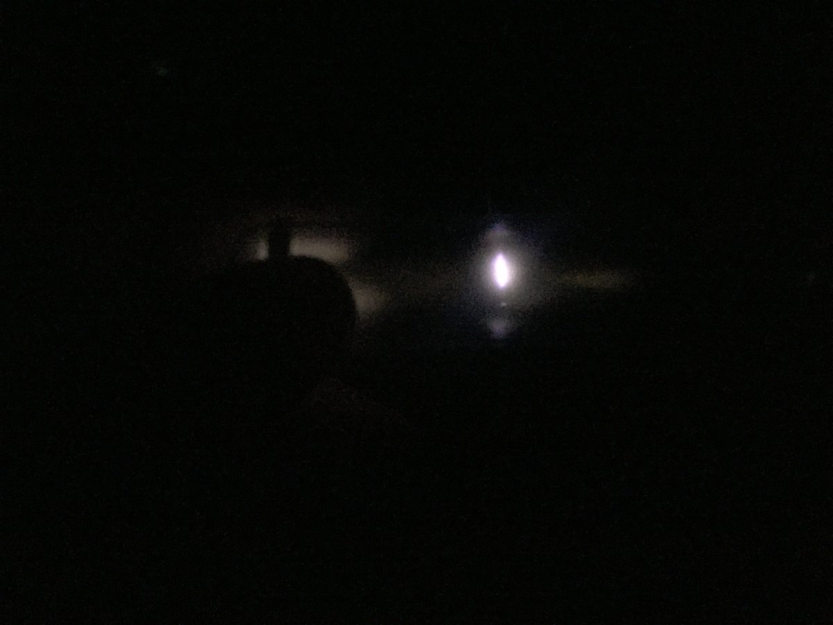 Oxygen  @elementphotos. Discharge tube's quite difficult to get a good photo of - glow is quite faint and diffuse white, though purple at the source to the eye. The container has a smaller gas ampoule plus two synthetic rubies (Al2O3 with Cr impurities giving the colour).