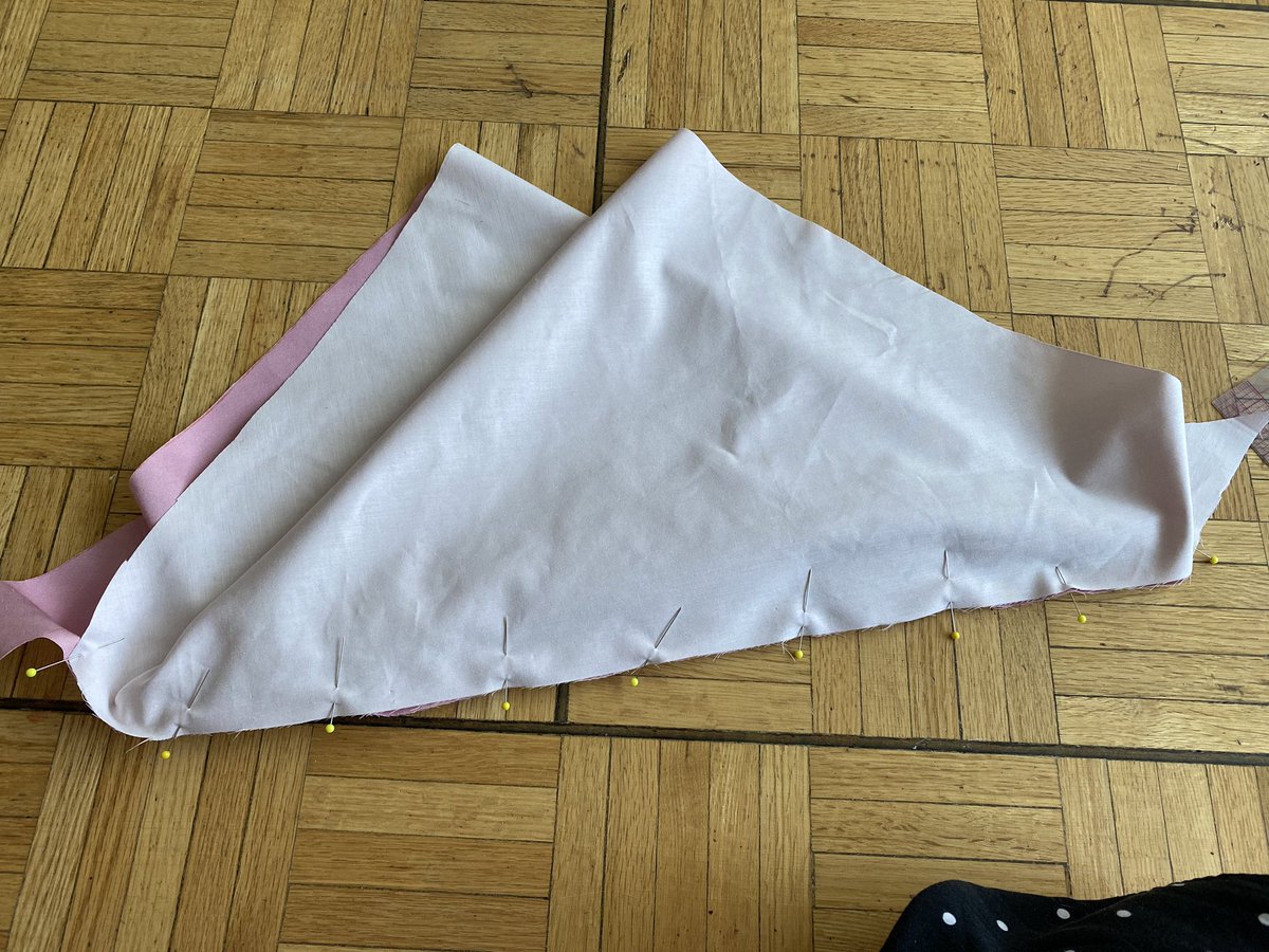 When you pin it together, you will get a really weird shape like this (why I showed how to line it up with the right sides. )