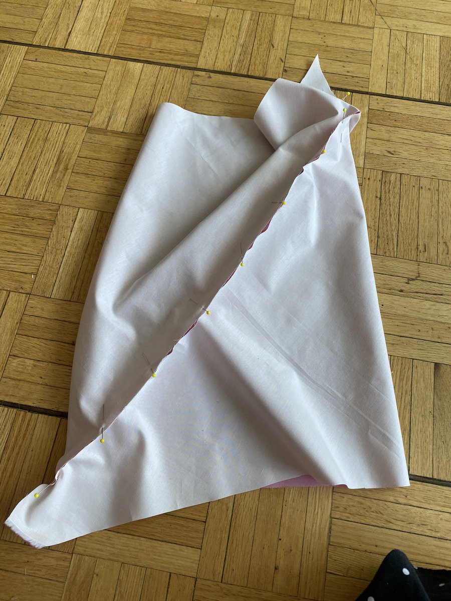 When you pin it together, you will get a really weird shape like this (why I showed how to line it up with the right sides. )