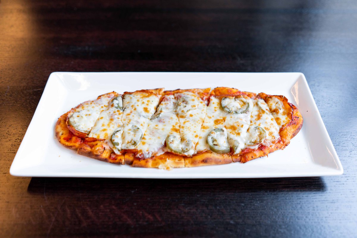 Spice up your week with our Jalapeño Hot Pepperoni Flatbread Pizza! 🌶 🍕

Call for a reservation or take-out order.
(816) 216-7978