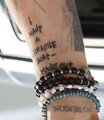 LauraBockov's tweet photo. @SapranoGia @nikkban Pretty sure its the tattoo he has had for a long time now https://t.co/9fmYxHFOGV