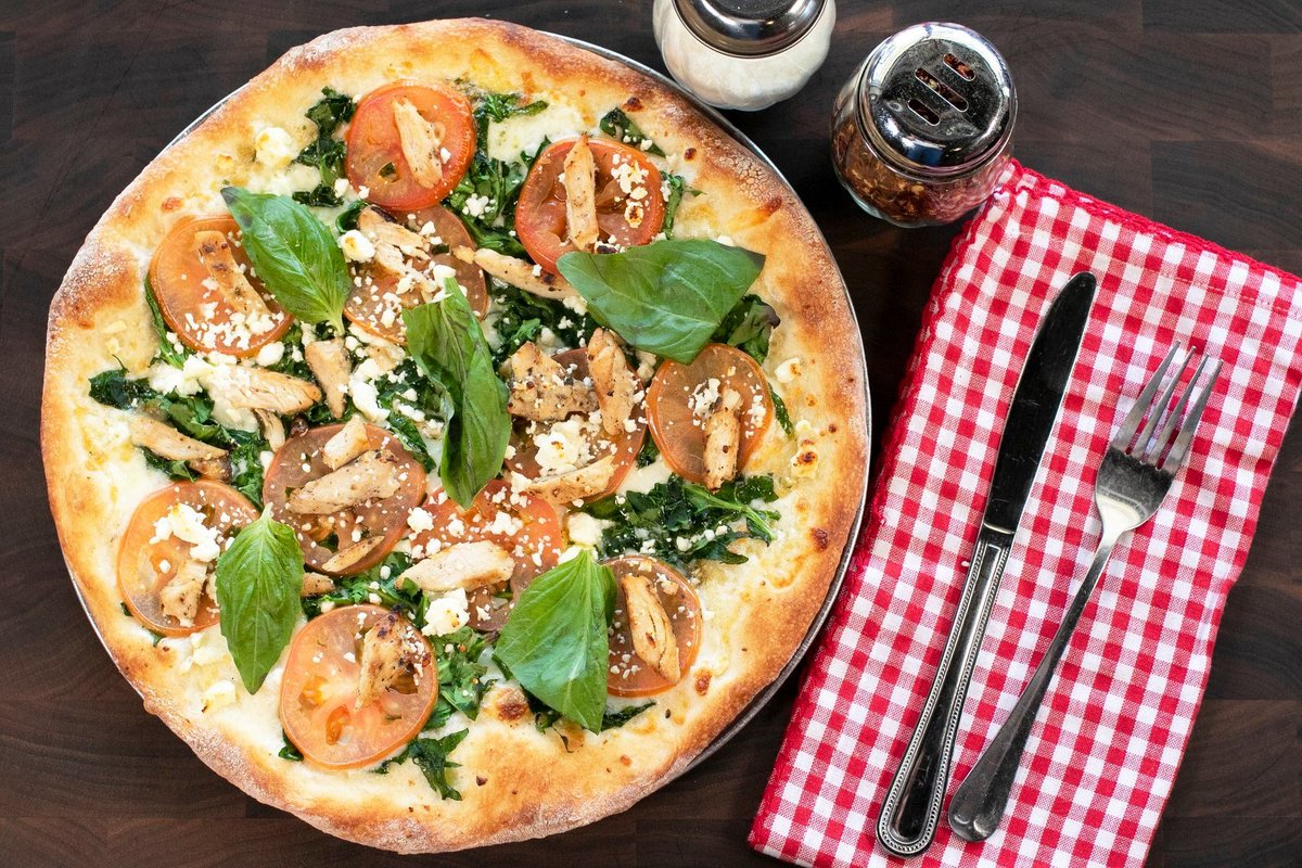 It’s lunchtime! 🍽🍕⁣
Skip the salad today and opt for something for interesting, like our Chicken Rustica Pizza. Freshly baked with fresh spinach, Roma tomatoes, feta cheese, Wisconsin mozzarella, grilled chicken &amp; Sicilian extra-virgin olive oil garlic sauce. -drools- 🤤🤤⁣