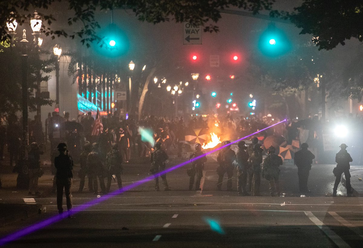 Officers emerged and immediately started with the crowd control.