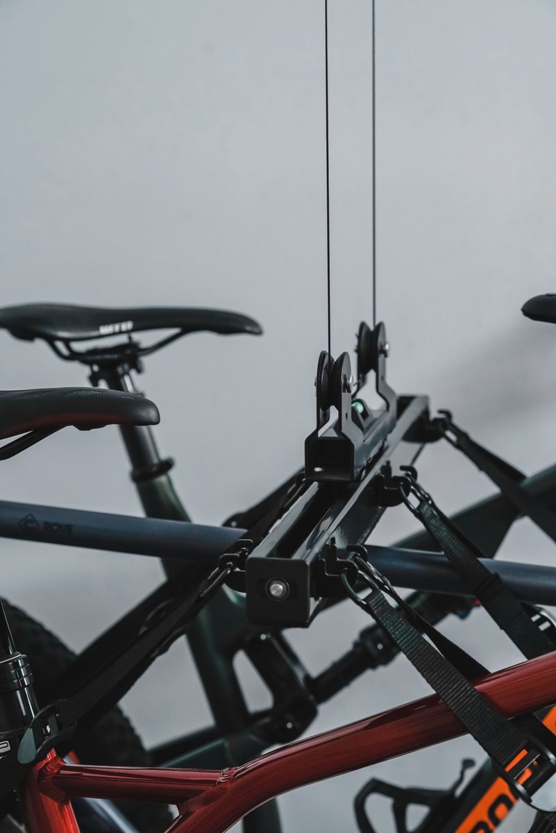 GarageSmartcom's tweet photo. Bluetooth-controlled, balanced bike storage. Visit https://t.co/ej7y8nsKoZ to shop.⁠ https://t.co/a5VEodEsho