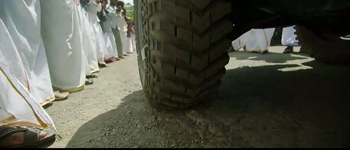 Viswasam  #ThalaEntry Thread: That is a collector's office.. People were with quarrels. Sudden buzz from the entrance.Seems like someone is coming. His Jeep is spotted. People in huge numbers are waiting. And the camera is moved to the left wheel of the jeep. 