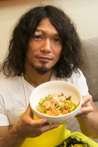 the bandaid makes him look more handsome while he cooks a *checks notes* ...salad