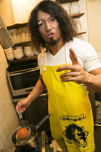 the bandaid makes him look more handsome while he cooks a *checks notes* ...salad