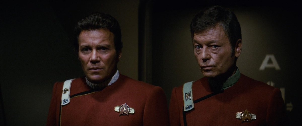 After TMP the Flying A was the de facto  #Starfleet emblem. Star Trek II: The Wrath of Khan repurposed TMP’s Admiral Kirk Class A insignia pin as the standard device, in brass instead of gold, and on officers set over a bar device, with TMP patches on engineering suits, etc.