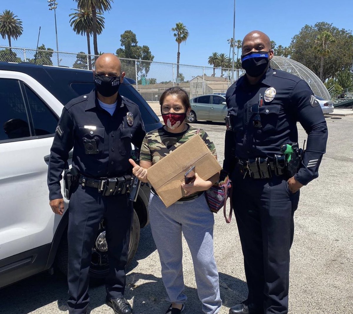 LAPDChiefMoore's tweet photo. As the COVID-19 pandemic continues, our LAPD South Park CSP (Community Safety Partnership) Officers continue to distribute meal kits to those in need. The work of community based policing and building relationship continues to be cornerstones of our ethos. https://t.co/EZ2EDvc7XN