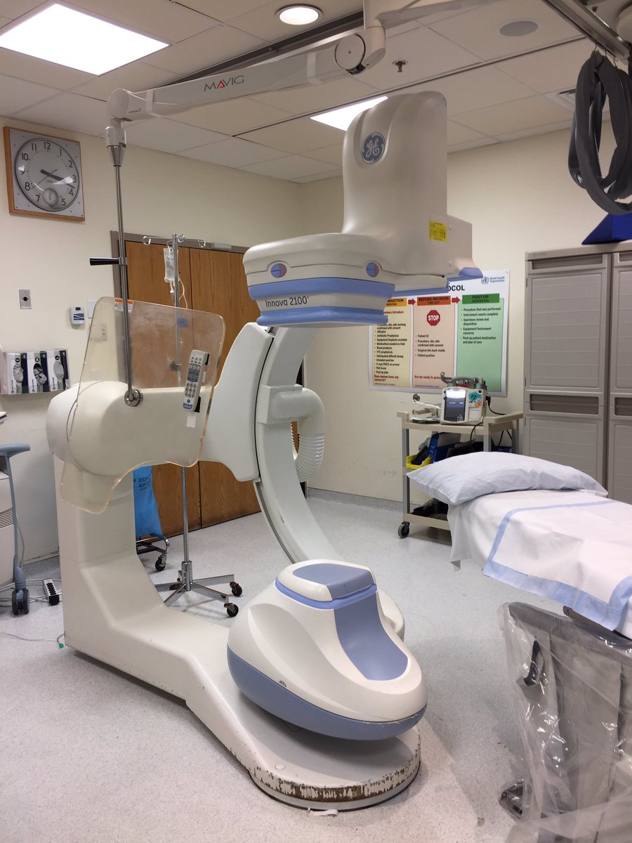 28. When they were finally ready for me after my spyrometry, I was taken to the cardiac cath lab. This machine is a C-arm - an X-ray used to help them place the cardiac catheter in the right side of my heart. They also used an ultrasound. https://avantehs.com/p/ge-innova-2100-cath-angio-system/13788