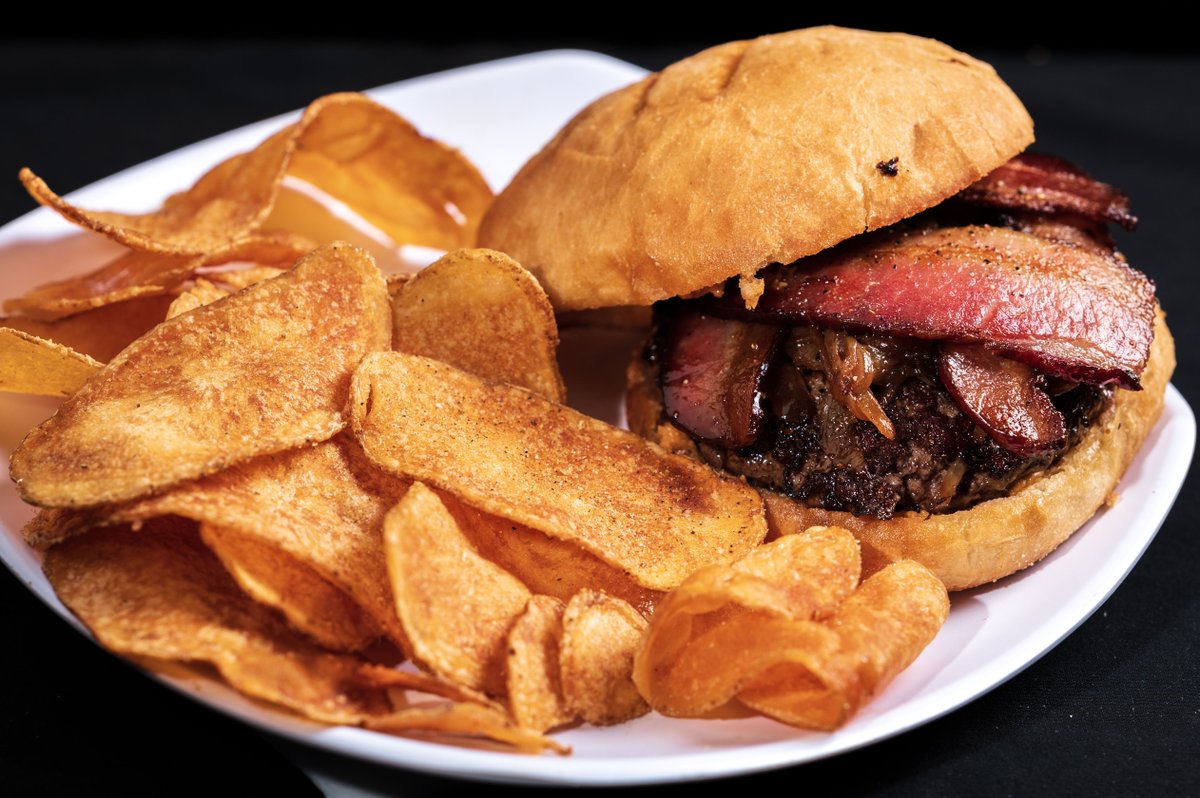 RevsBarAndGrill's tweet photo. This week we will be featuring the Joshua Burger for $9.99! This new burger is loaded with flavor: Angus beef patty, caramelized onions, crispy bacon, house made peanut butter honey sriracha sauce on a brioche bun! Served with house chips, or upgrade to another side option. https://t.co/9OF0nrI1iO