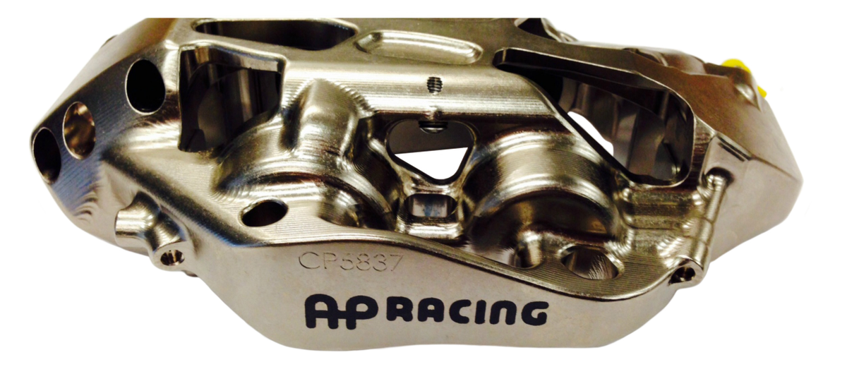 If we put the GT3 caliper beside the NASCAR SuperSpeedway caliper, you will notice how much more machine work is done to the NASCAR caliper. This is because even the brake calipers are an aerodynamic device on a NASCAR stock car.