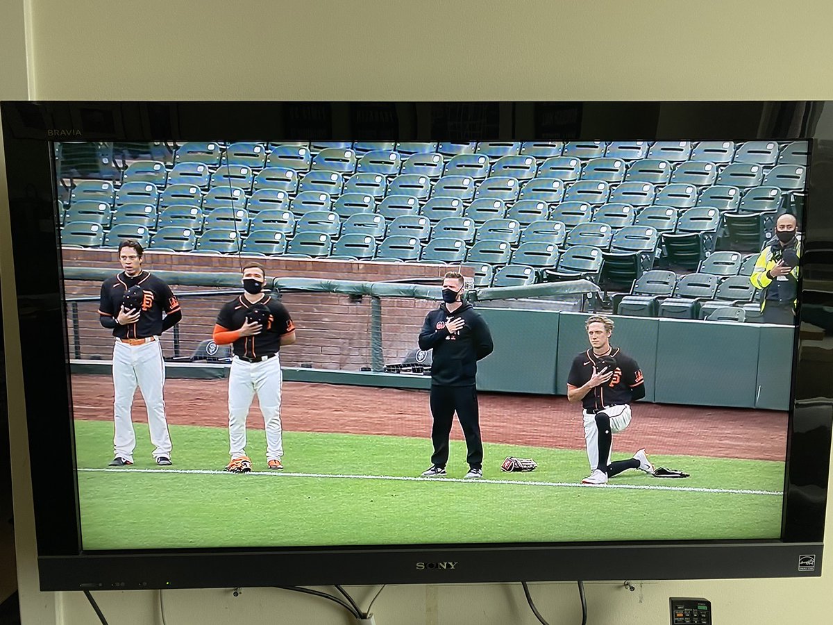 carmenkiew's tweet photo. Hunter Pence and Pablo Sandoval kneeling during the anthem. Couldn’t be prouder. #BlackLivesMatter https://t.co/nGHIw6oXpu