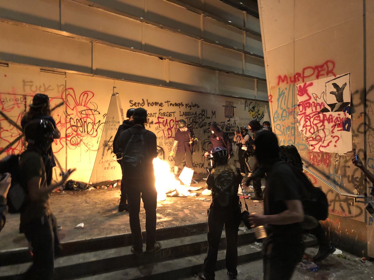 But at the federal courthouse a bonfire has been lit in the portico.