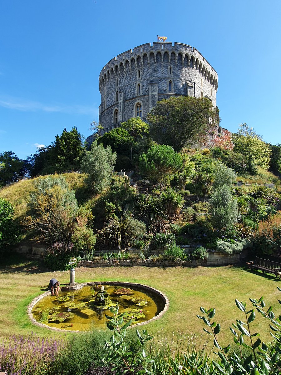 Last minute touch up of the pond in the Moat Garden