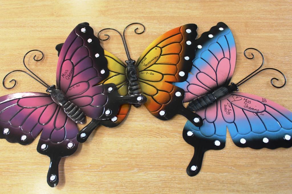 WPS_Success's tweet photo. A socially distant social to end a socially distant term, with a new style staff photo 📷 We said a sad farewell to three wonderful teachers - thank you for the memories and the gifts for our school Butterfly Garden 🦋 https://t.co/vqAapFoaH4
