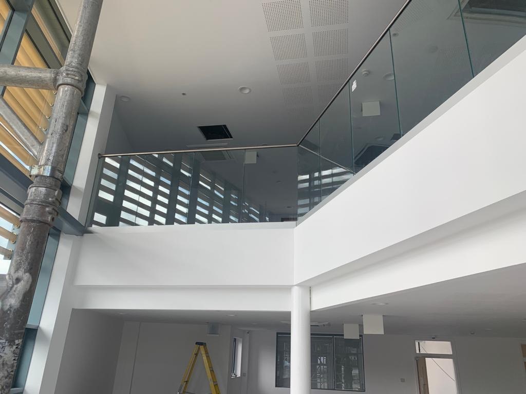 new frameless glas balustrade to atrium area at the new chamwell centre building at the milestone school Gloucester