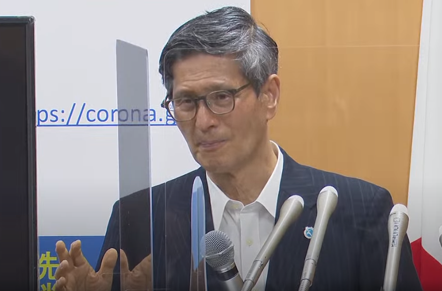 If more severe measures were taken, such as a lockdown, Japan could tackle the virus more quickly, Omi says. BUT, he says, that's not the goal. The goal is to keep the economy running while also managing the infection.